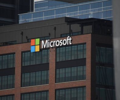 A tall building with a microsoft logo on top of it windows store error, authentication fail, Microsoft account