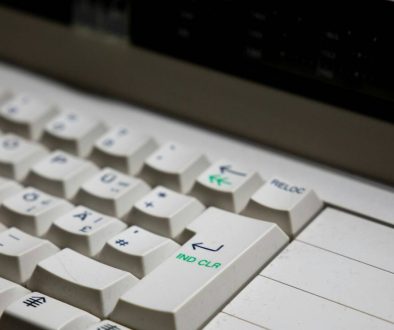 white computer keyboard on gray surface keyboard switches, mechanical keyboard, closeup keys