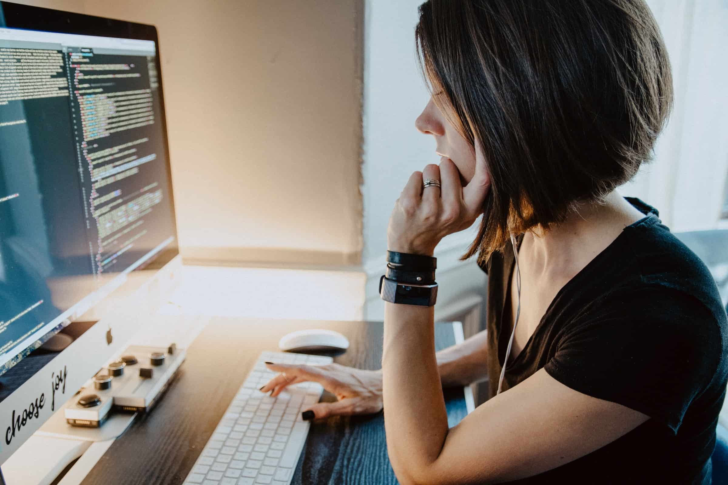 Woman using Mac pc