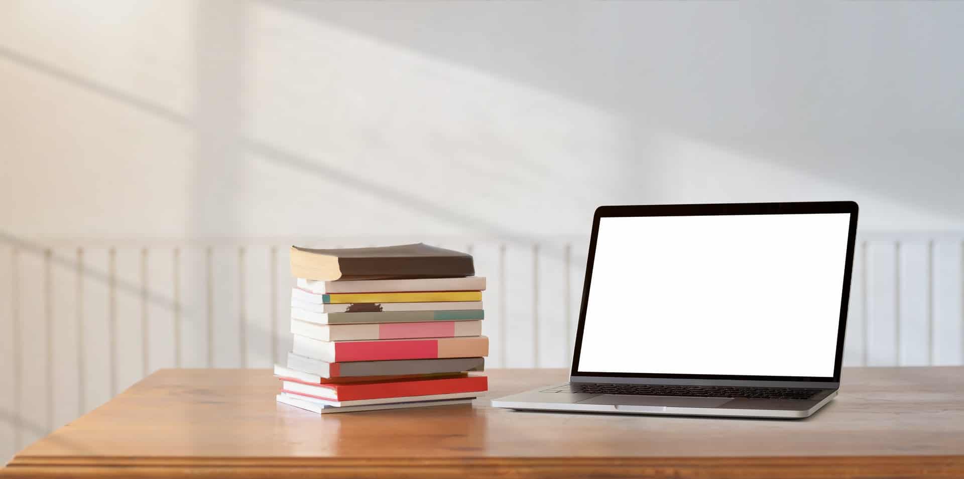 Laptop and books