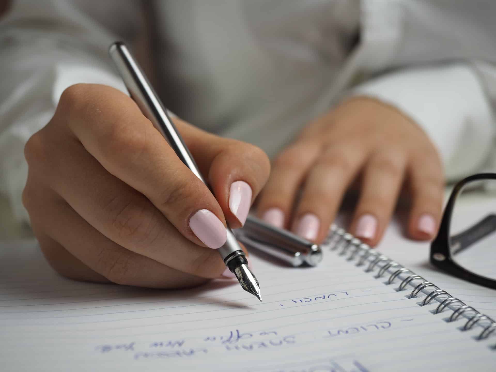 Woman writing list