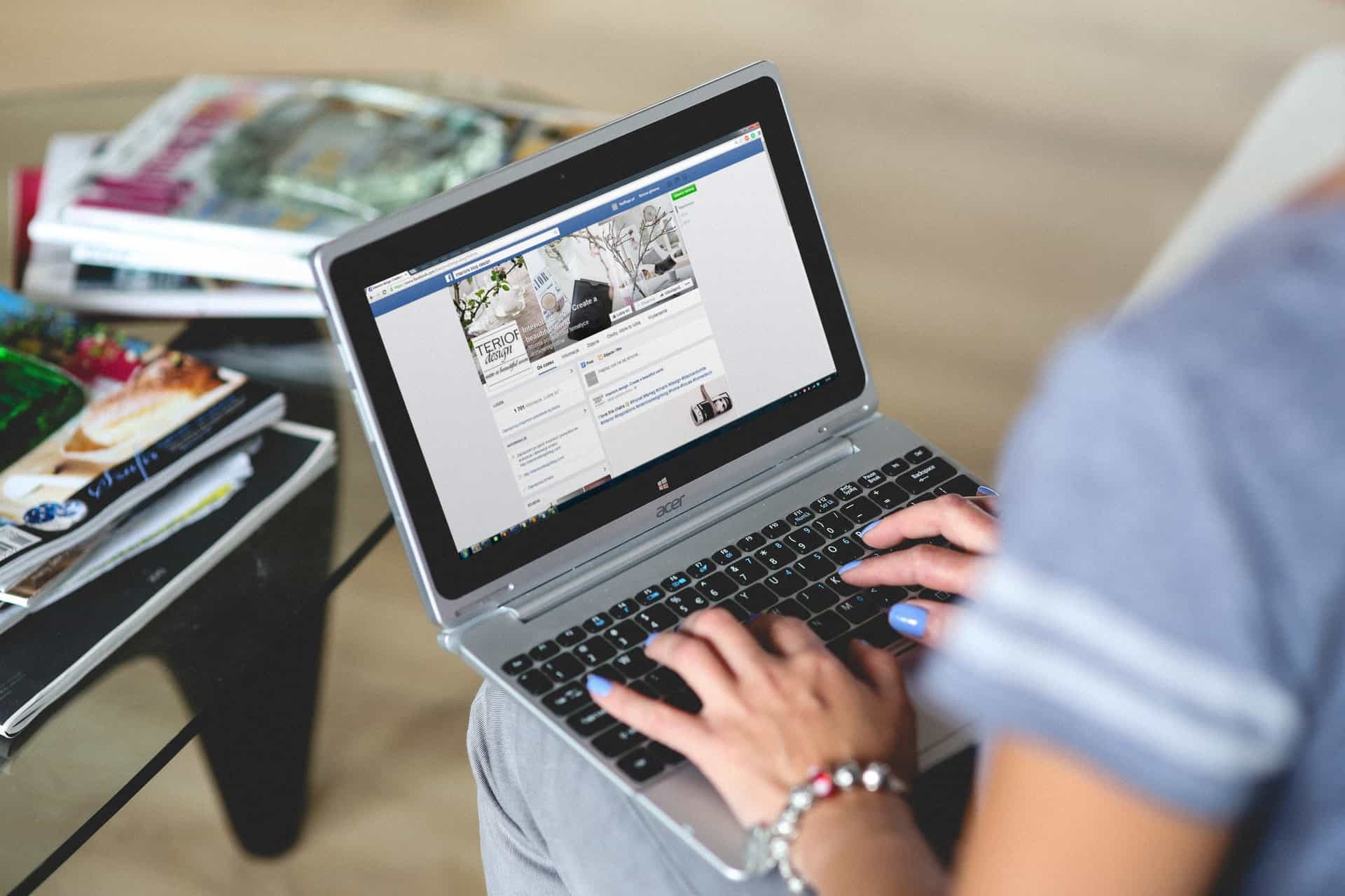 Woman writing FB post