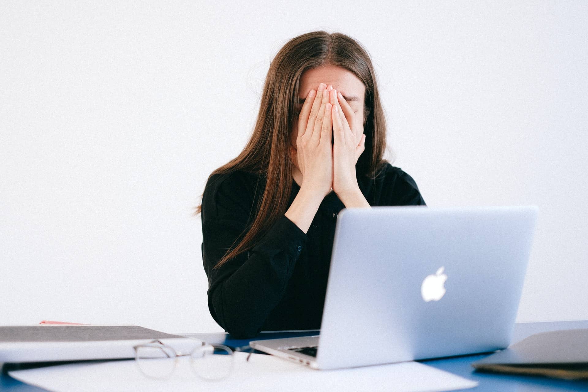 Woman covering face