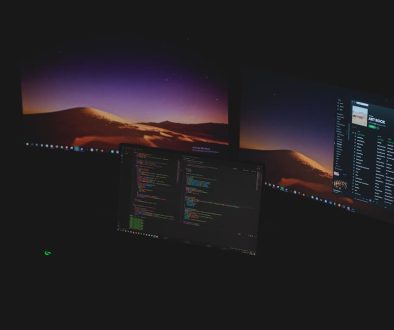 black flat screen computer monitor turned on near blue and white sky windows task manager, restart explorer, taskbar fix