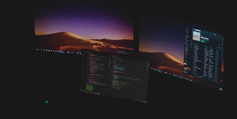 black flat screen computer monitor turned on near blue and white sky windows task manager, restart explorer, taskbar fix