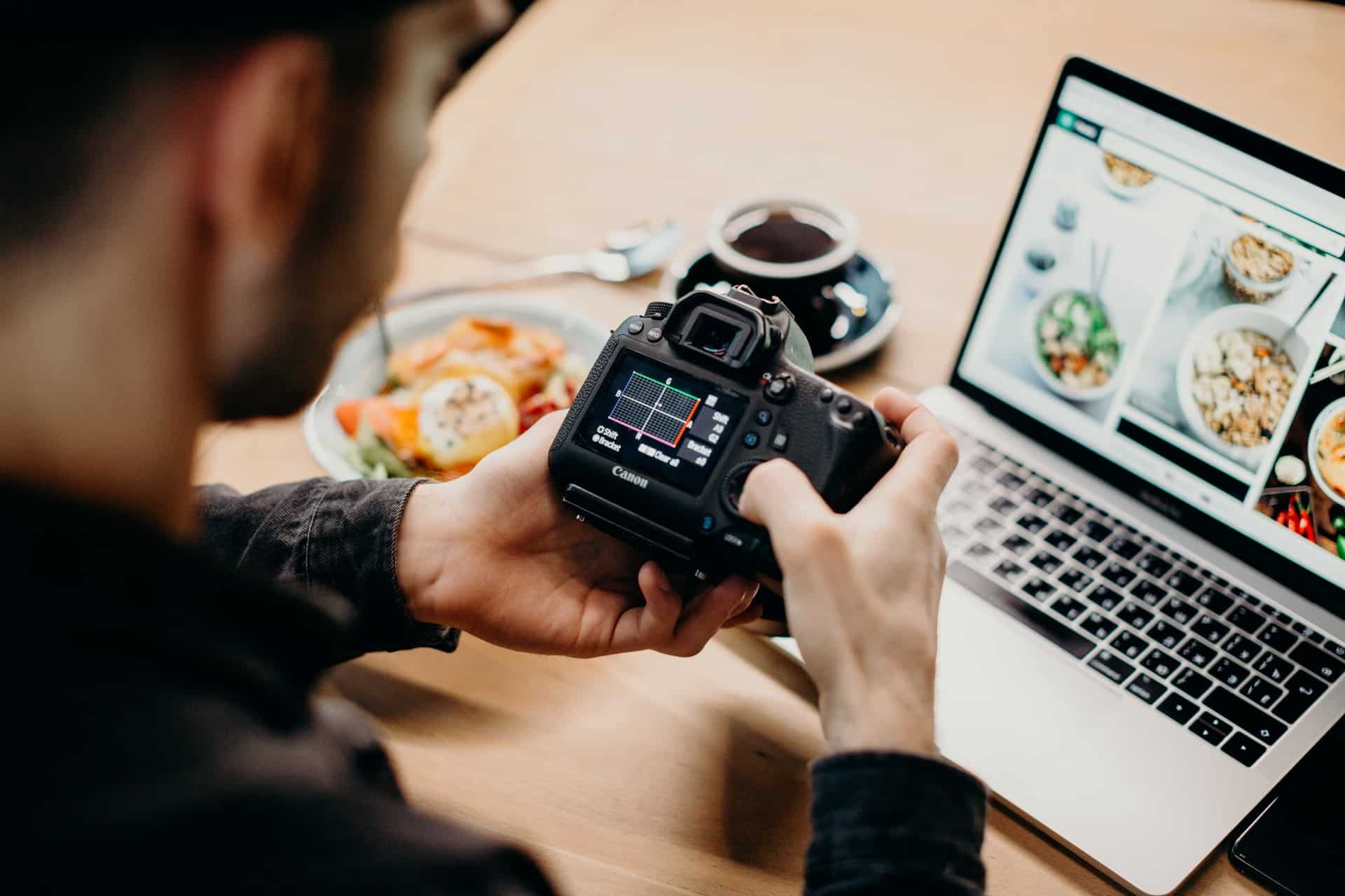 Photographer looking at images