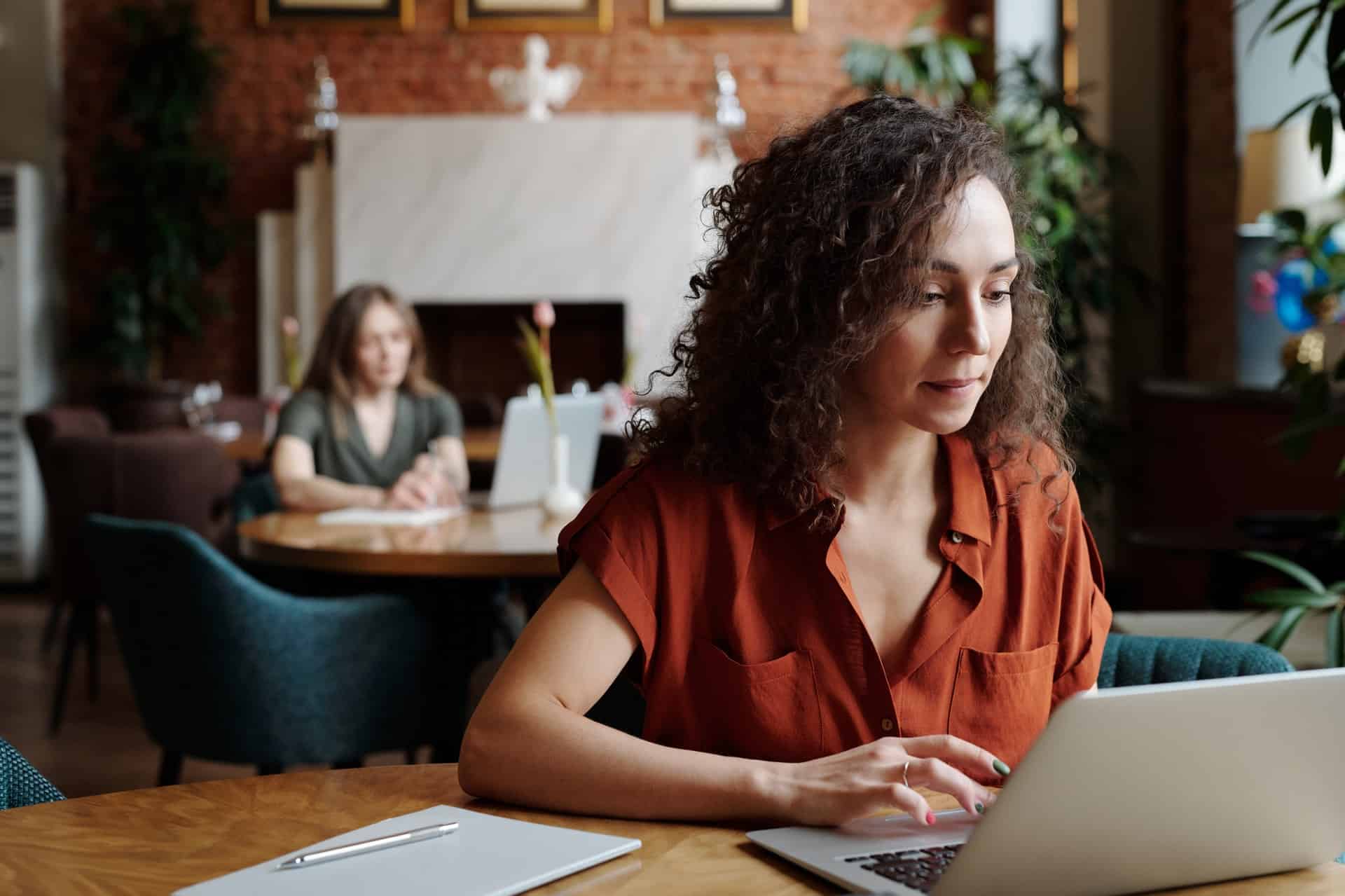 Woman working in café