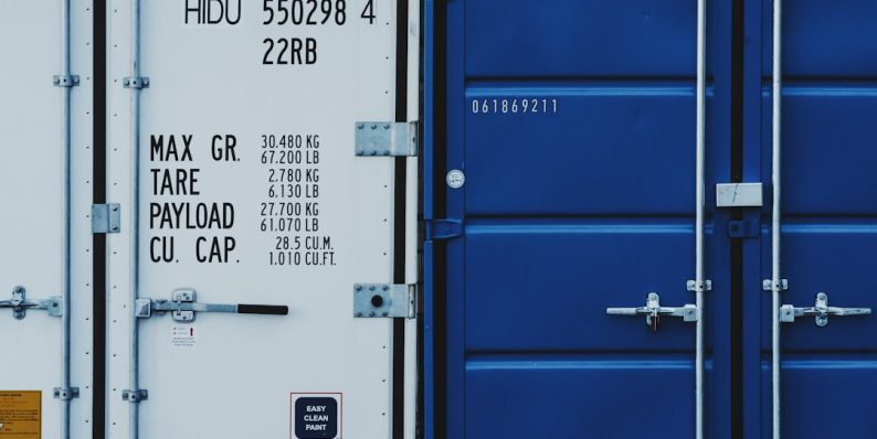 a couple of blue and white shipping containers h264 mp4 comparison diagram, file types, video container codec