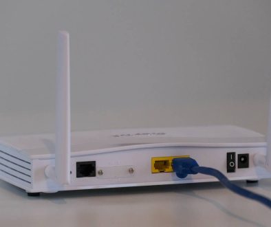 white router on white table slow internet connection, error message, wifi symbol
