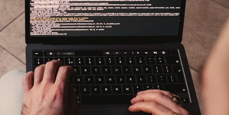person using black laptop computer windows task manager, process searchapp exe, performance tab