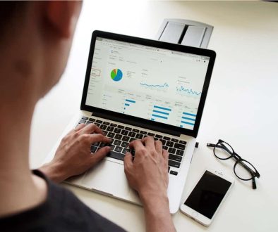 person using MacBook Pro data crowdsourcing blockchain collaboration