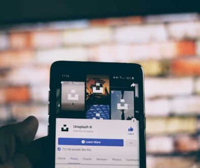 black smartphone turned on mobile streaming,content personalization,technology team