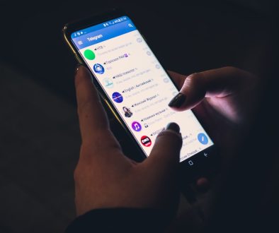 person using smartphone memu emulator ui, nox emulator comparison, android games on pc