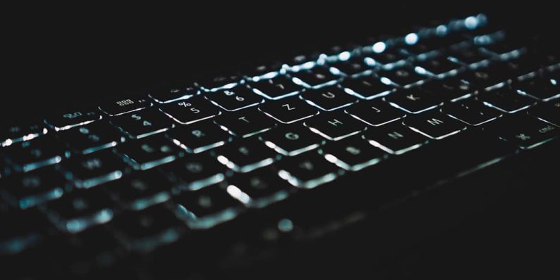 black computer keyboard on black surface artificial intelligence, reverse image search, computer screen