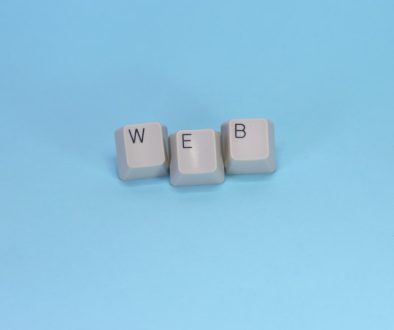 Keyboard keys spell out the word "web." wordpress error messages, broken site, website down