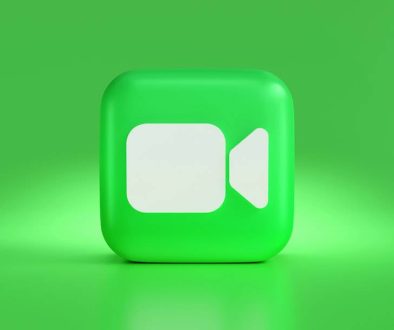 a green square button with a white speech bubble inshot app, mobile editing, video transitions
