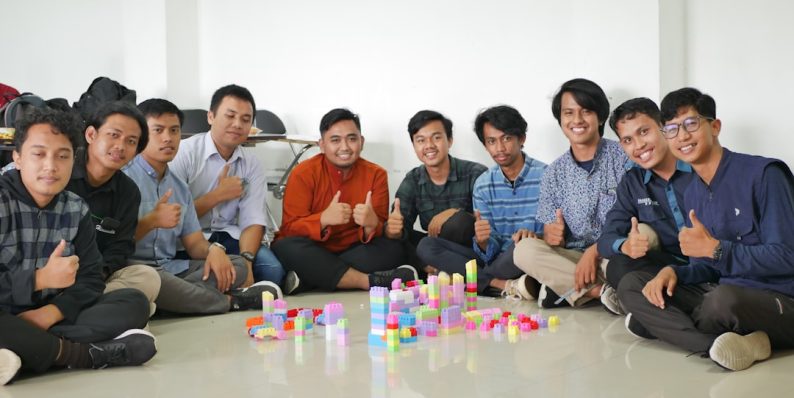 a group of men sitting next to each other influencer collaboration, product showcase, small business owner