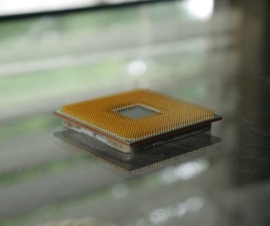 brown and black book on glass table intel cpu, laptop processor, i7 4300mq