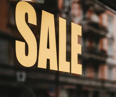 yellow sale text printed on glass window tiktok ecommerce, smartphone shopping, video marketing