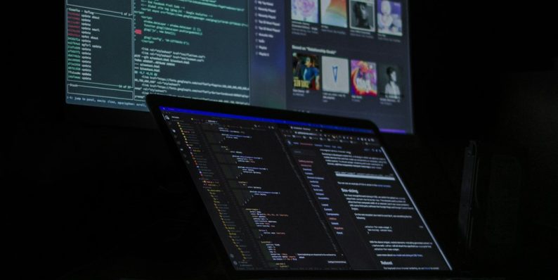 a laptop computer sitting on top of a desk twitch dashboard, vod download, creator interface