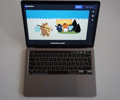 a laptop computer sitting on top of a white table happy user laptop browsing ad free