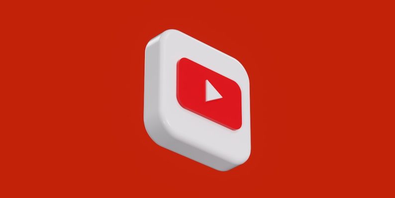 a red and white play button on a red background youtube creator, video editing, ai interface