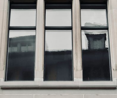 a tall building with a clock on the side of it windows dism command line