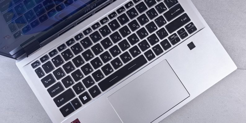 an open laptop computer sitting on top of a table student laptop security vpn
