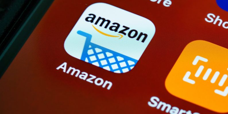 black smartphone showing logo guessing game amazon search history, online shopping, privacy settings