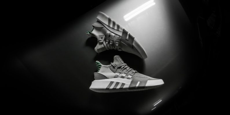 grayscale photo pair of adidas shoes sneaker proxy setup, bot interface, copping sneakers