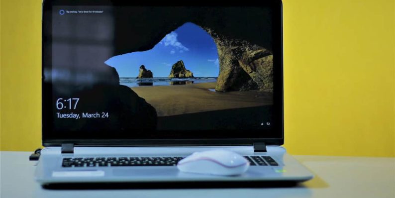 macbook pro displaying 12 00 happy user laptop browsing ad free