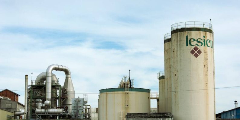 photo of white and green steel tank oil rig, sensors, industrial equipment