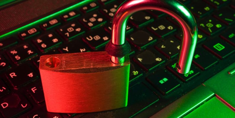 red padlock on black computer keyboard phishing email, data breach, device isolation