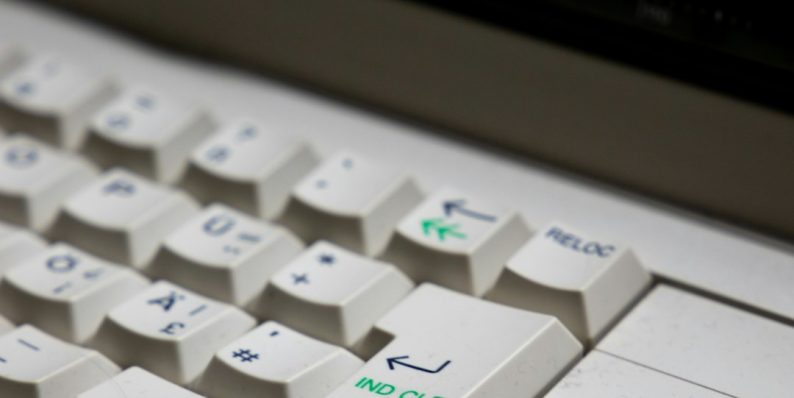 white computer keyboard on gray surface keyboard switches, mechanical keyboard, closeup keys