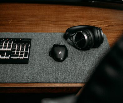 a black headphones on a black surface controller buttons, fortnite keybinds, gaming controller