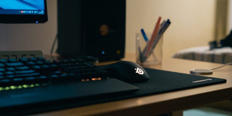 a computer mouse and keyboard business owner working on laptop, wordpress admin dashboard, cybersecurity lock icon