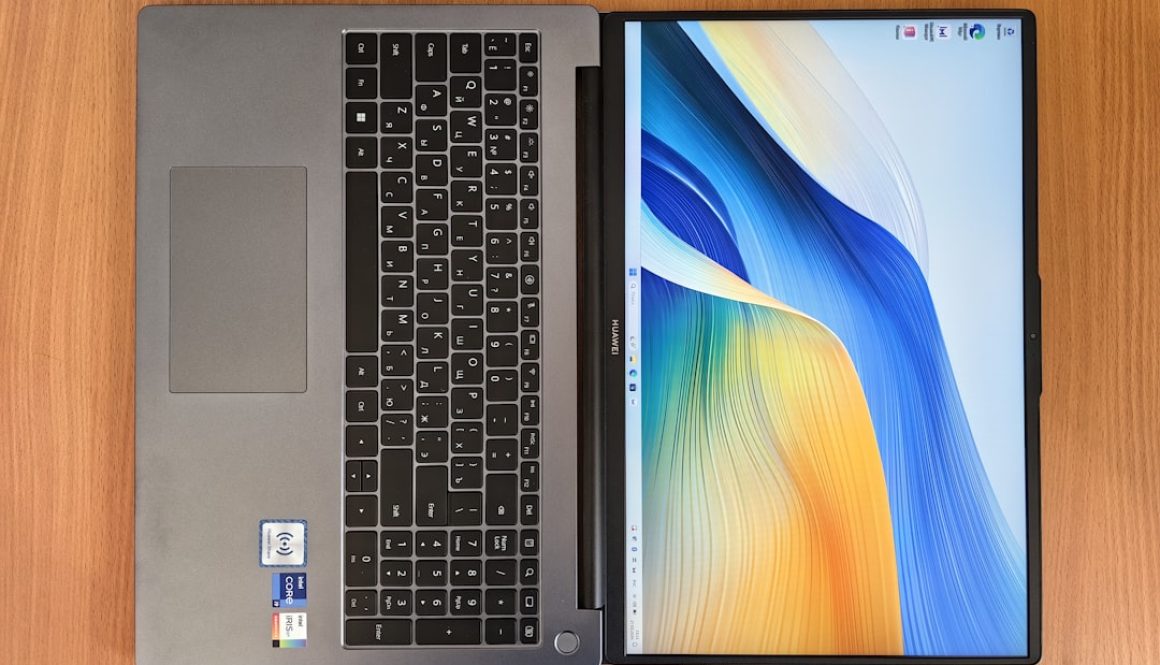 a laptop computer sitting on top of a wooden table student laptop self discovery