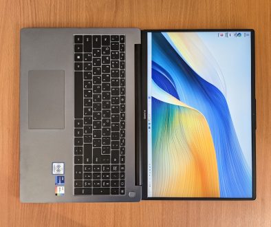 a laptop computer sitting on top of a wooden table student laptop self discovery