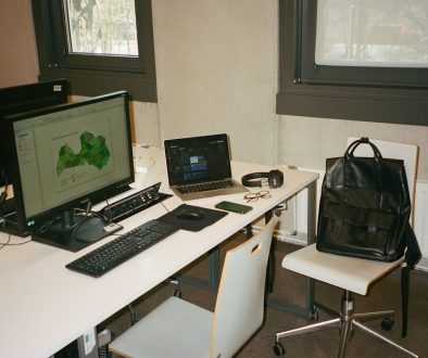 a white desk with a laptop and a computer on it laptop lock kensington desk office