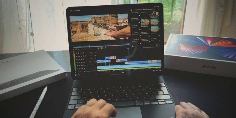 black and silver laptop computer timeline editing, video software interface, zoom tool