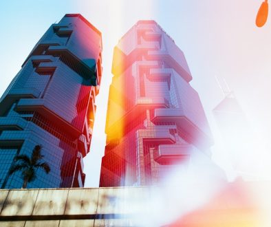 low-angle photography of high-rise building fortnite gameplay, fast building, aiming controller