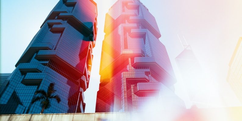 low-angle photography of high-rise building fortnite gameplay, fast building, aiming controller