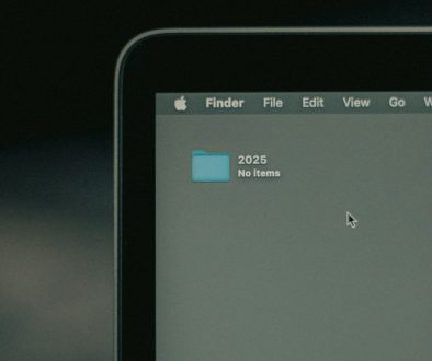 A close up of a person holding a cell phone outlook interface settings toolbar
