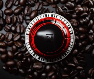 black and red round logo coffee crypto savings vault app