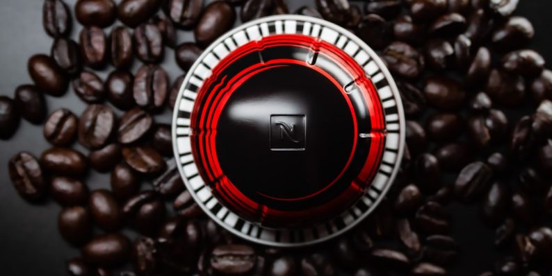 black and red round logo coffee crypto savings vault app