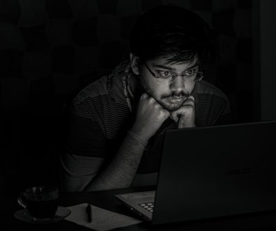 man in black and white striped shirt using black laptop computer roblox lagging task manager memory man in black and white striped shirt using black laptop computer roblox lagging task manager memory