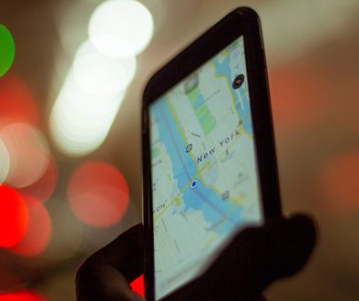 person holding smartphone displaying GPS tracking apps, delivery management, smartphone dashboard person holding smartphone displaying GPS tracking apps, delivery management, smartphone dashboard