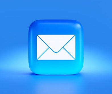 a blue button with a white envelope on it email automation, ecommerce marketing tools, ai personalization