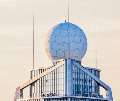 a very tall building with a very large ball on top of it cdn network globe failover architecture