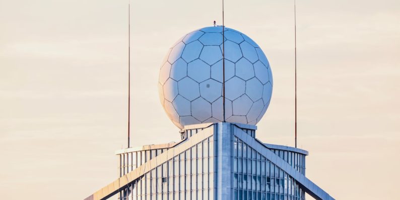 a very tall building with a very large ball on top of it cdn network globe failover architecture